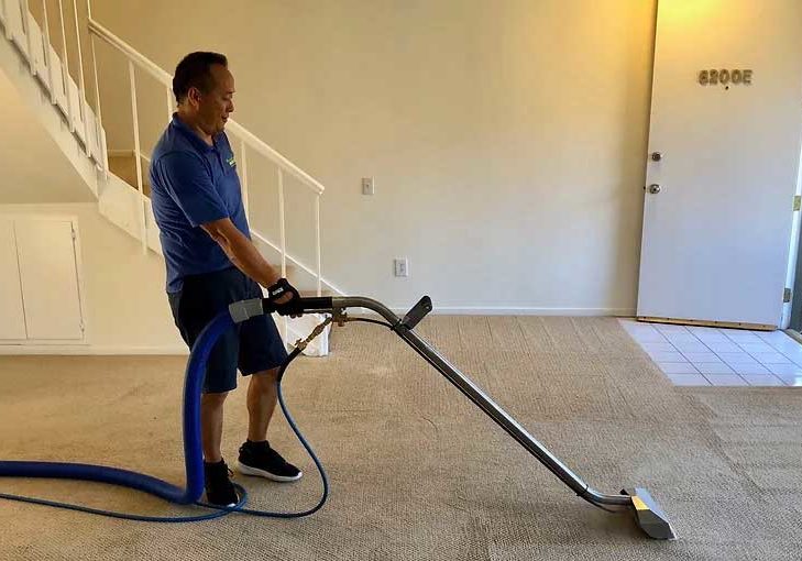 Professional carpet cleaner cleaning the carpet in Malibu, CA